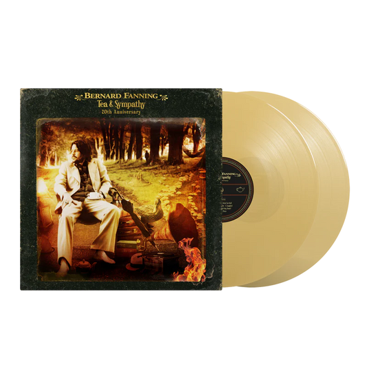 Vinyl record with cover featuring a person in a scenic setting, labeled 'Bernard Fanning' tea and sympathy with 2 gold vinyl