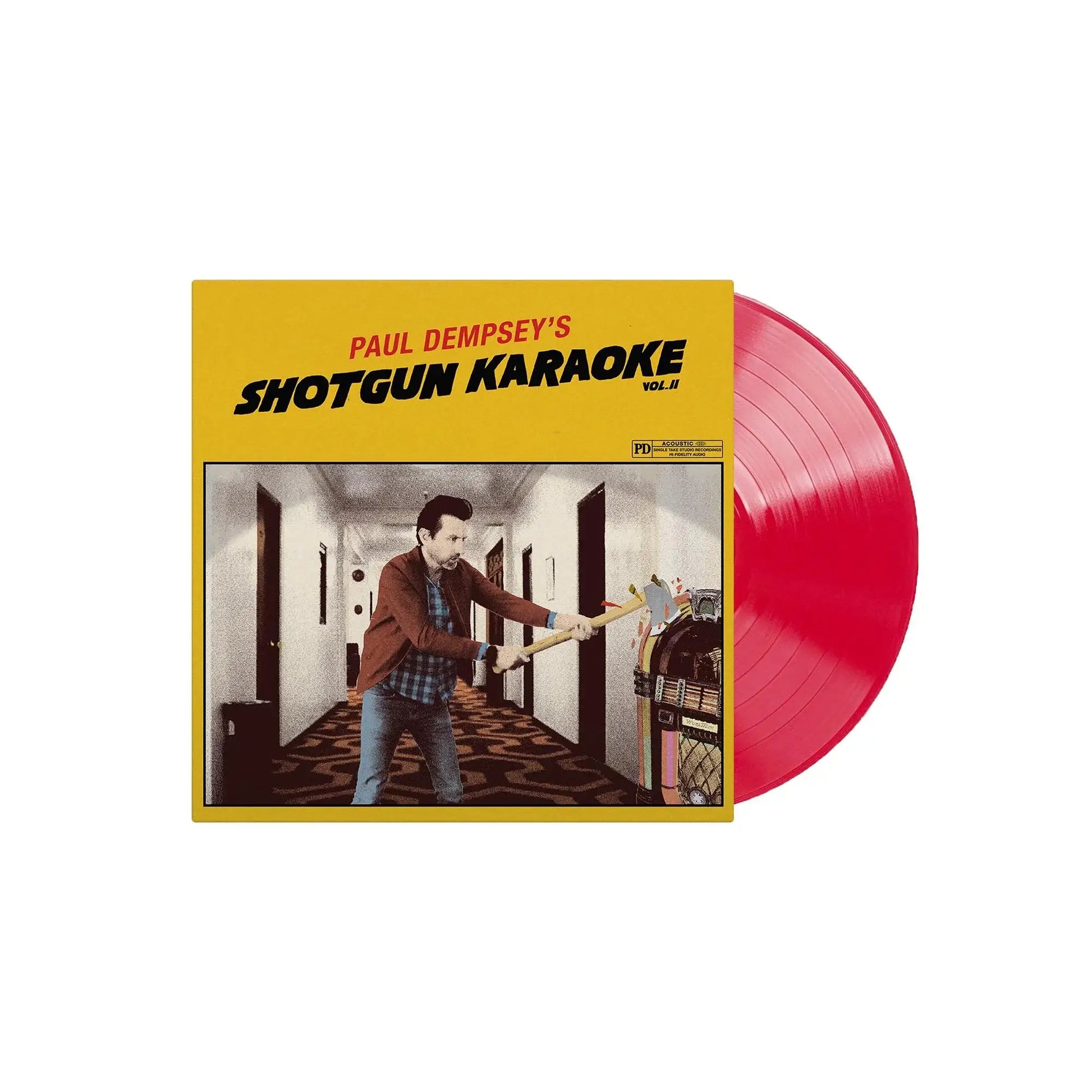 Vinyl record with yellow cover featuring a person holding a shotgun in a hallway, titled 'Paul Dempsey's Shotgun Karaoke Vol. II'.