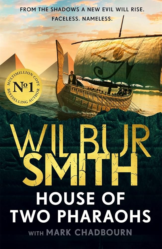House of Two Pharaohs by Wilbur Smith, paperback historical fiction novel.
