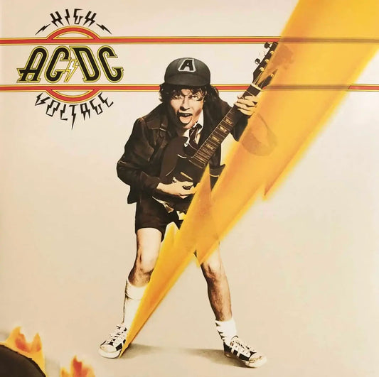 Album cover for AC/DC's 'High Voltage' with a guitar player and lightning bolt design.