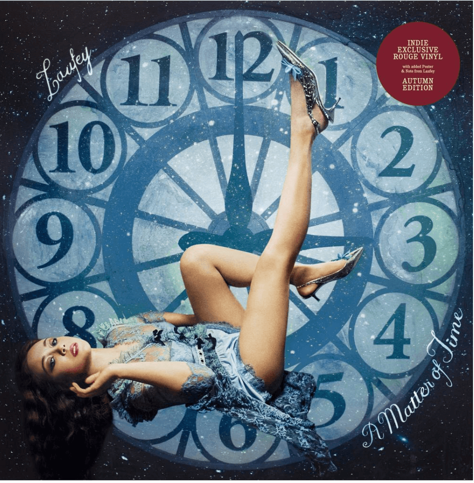 A Matter of Time by Laufey album cover showing a figure floating over a clock; red sticker reads Indie Exclusive Rouge Vinyl - Autumn Edition.