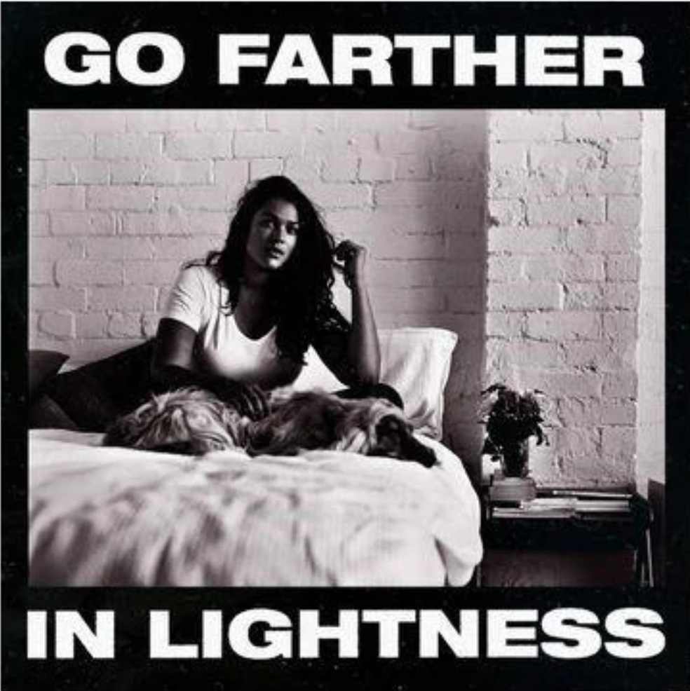 Gang of Youths – Go Farther in Lightness album cover: black-and-white photo of a woman sitting on a bed with a dog; bold title text top and bottom.