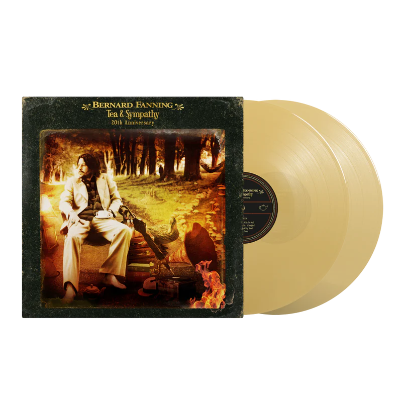 Vinyl record with cover featuring a person in a scenic setting, labeled 'Bernard Fanning' tea and sympathy with 2 gold vinyl 