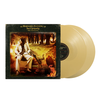 Vinyl record with cover featuring a person in a scenic setting, labeled 'Bernard Fanning' tea and sympathy with 2 gold vinyl 
