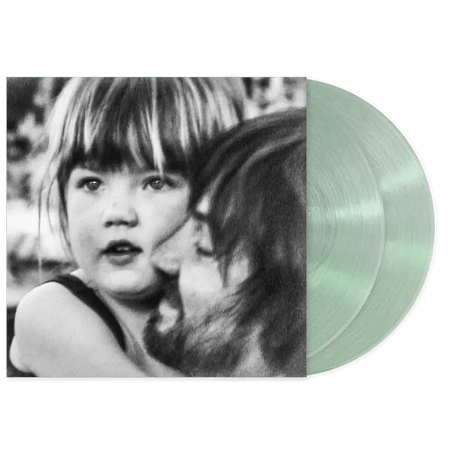Tame Impala latest album.. Vinyl record with a black and white photo of a child on the cover and two coke bottle green vinyl lp