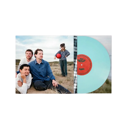 Blue Vinyl record with a cover featuring the Belair Lip Bombs in an outdoor setting.